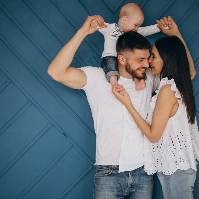Happy family with their first child